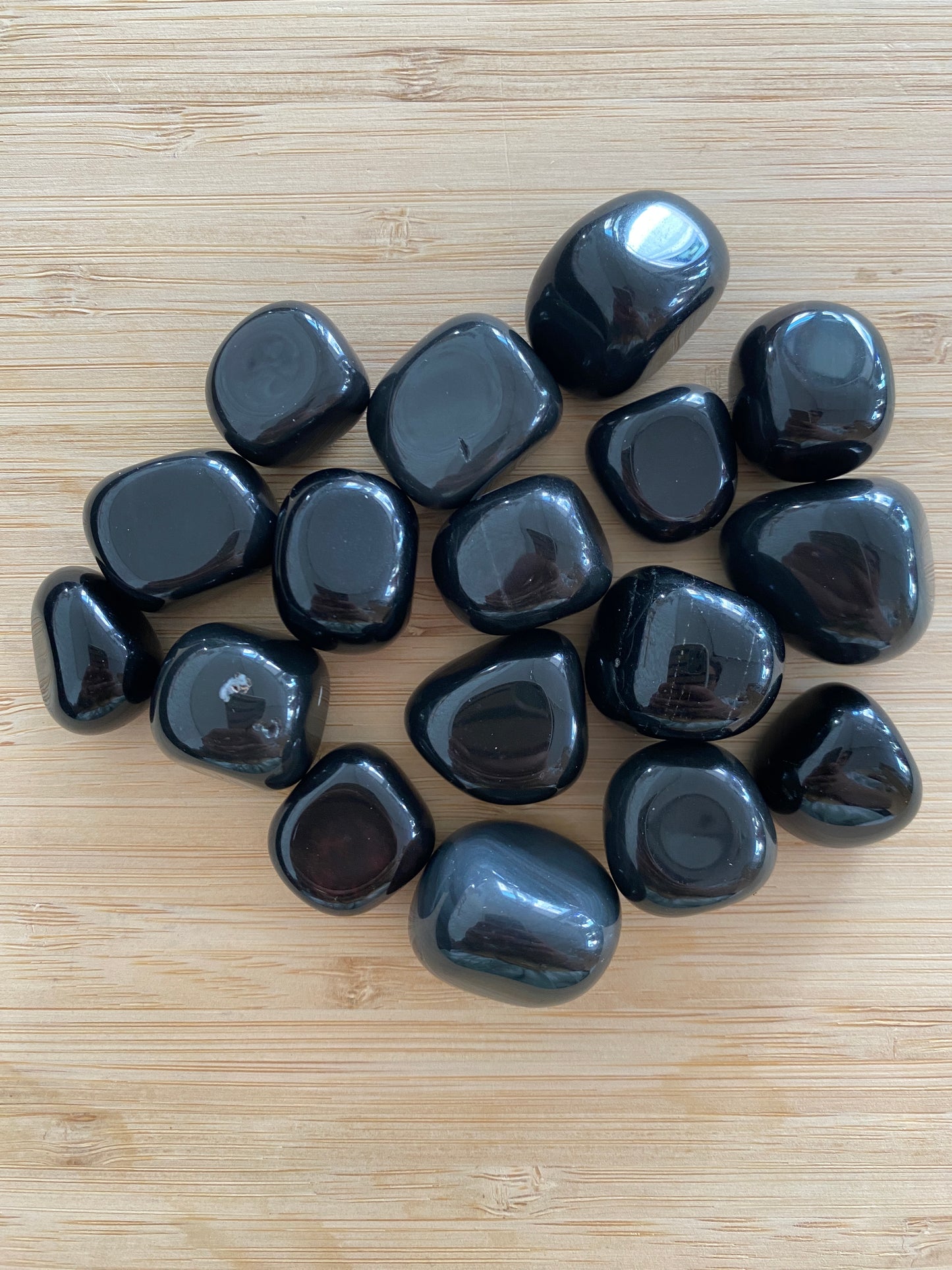 Piedra rodada obsidiana negra